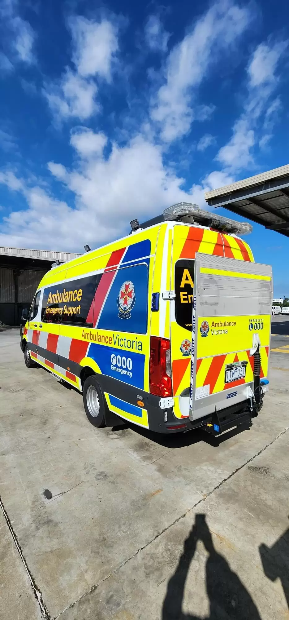 ambulance vehicle parked outside warehouse